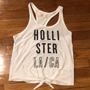 All white with words that say Hollister  La/Ca